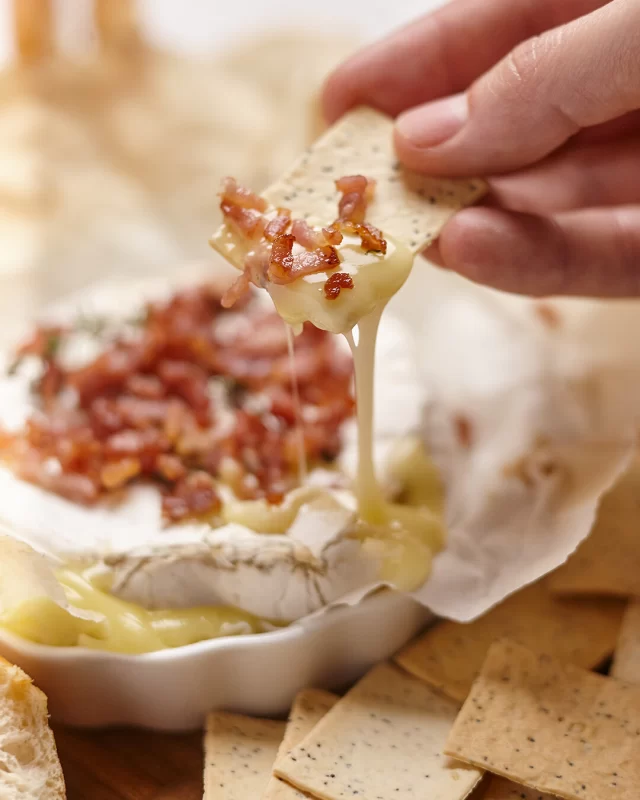 Bacon topped brie is a delight that shouldn't only be saved for special occasion. Next time you feel like cheese and a few nibbles, bake up your favourite brie and add some crispy bacon bits. You won't be disappointed.