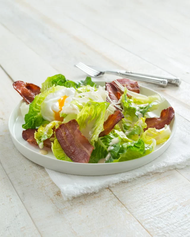 Trying to eat more salads in 2026? Go for one that's loaded with BACON! 🥓Our raw cured Smoked Streaky Bacon made with 100% Australian Pork is perfect in a Caesar salad. Try it this week and let us know how it goes!#caesarsalad #summersalad #bacon #australianpork