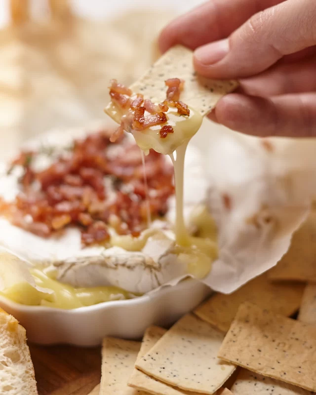 Easter is only a few weeks away, so we're bringing you all sorts of recipe and entertaining meal ideas that're sure to please. 😍This bacon-topped brie is a great option to elevate your cheese board with the perfect mix of creamy and salty. 🥓#baconrecipes #baconandcheeserecipes #glutenfreemeals #cheeseboardideas #entertainingfood