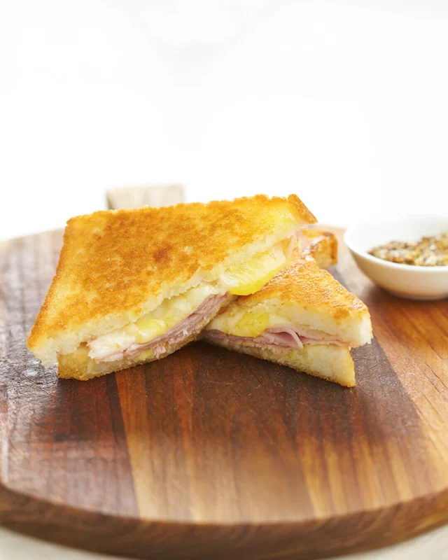 Nothing beats a classic ham and cheese toastie on a cool autumn day featuring our 100% Australian Leg Ham!Head to our website for tips on how to make the perfect toastie.Here's how to make the perfect ham and cheese toastie! ⬇️INGREDIENTS
British Premium Leg Ham of your choice
Bread of your choice
Cheese of your choice
Mustard
Mayonnaise
ButterMETHOD
Spread mayo on one slice of bread and mustard on the other.
Add the ham, top with cheese and close sandwich.
Butter the top of the sandwich and place top-down in a frying pan. Then butter the remaining side, ensuring you get every corner.
Cook for 3 minutes then flip. Cook further until cheese is melted through.#toastie #aussieham #winterwarmer #aussiepork #breakfastlover