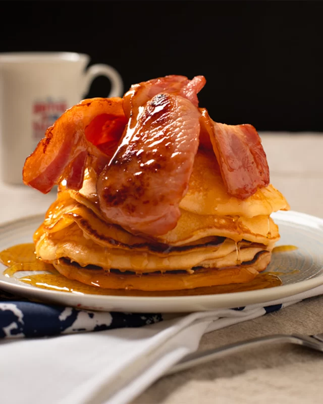 Feeling like something sweet AND savoury for breakfast? Luckily for you, a delicious bacon pancake stack offers both.Are you one to indulge in bacon and pancakes? 👀#baconandmaplepancakes #sweetandsavoury #britishbacon #breakfastideas #britishbreakfasts